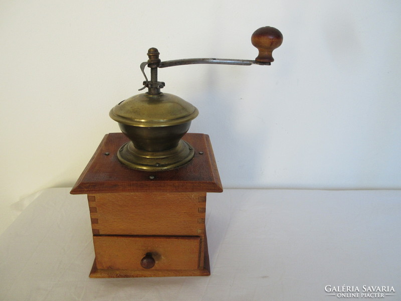 Old wooden coffee grinder with brass top. Negotiable!