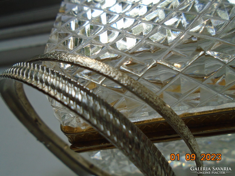 Two silver-colored embossed bracelets
