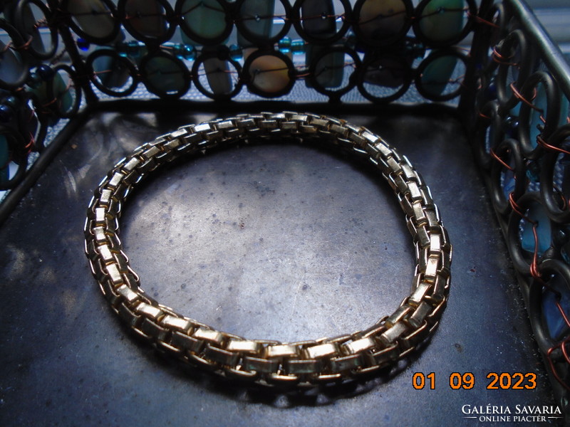Gold-colored openwork mesh rope bracelet