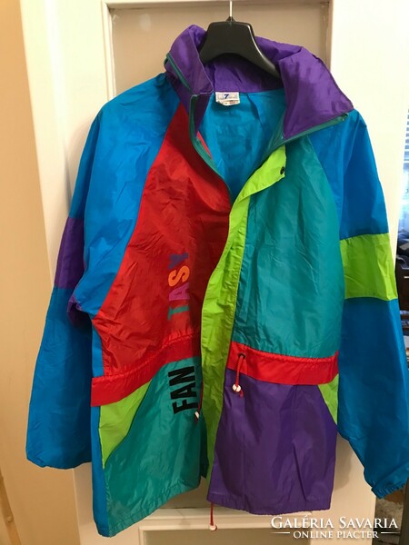 Blue7seven branded windbreaker and raincoat. With Fantasy lettering. Size 48. Beautiful, colorful, hooded.