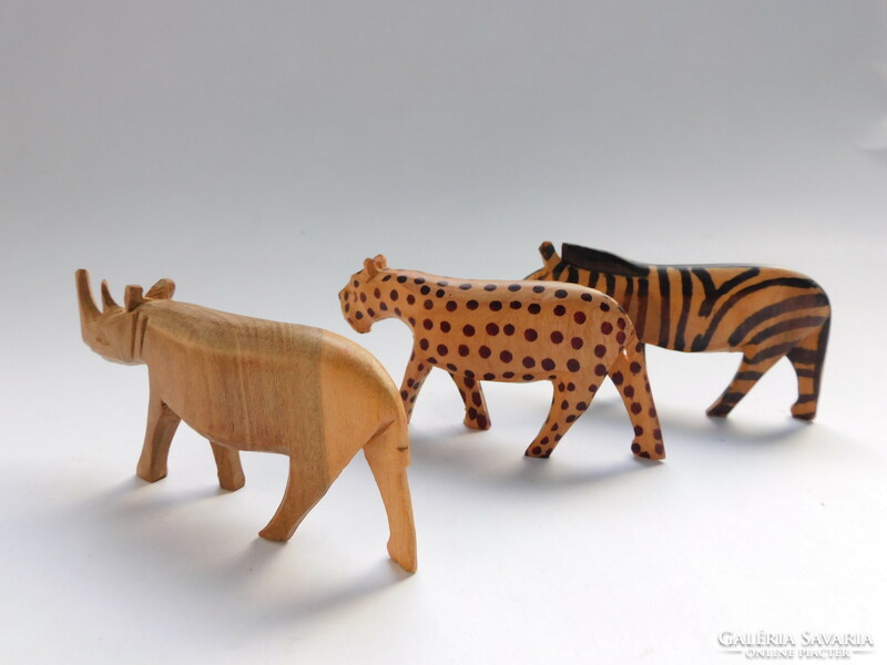 African animals carved from tropical wood - 3 pieces - rhinoceros, leopard, zebra