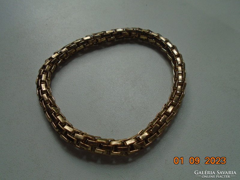 Gold-colored openwork mesh rope bracelet