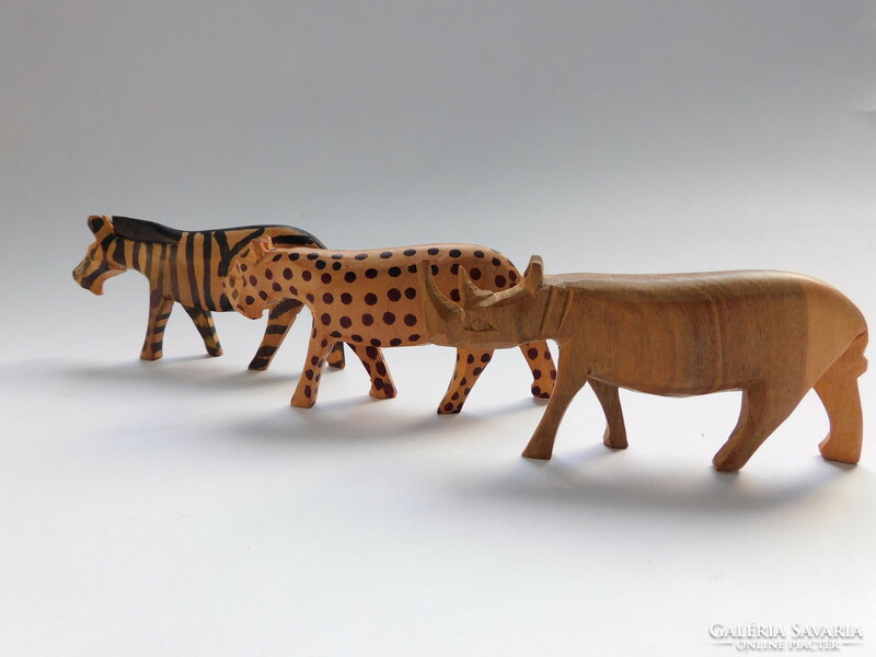 African animals carved from tropical wood - 3 pieces - rhinoceros, leopard, zebra