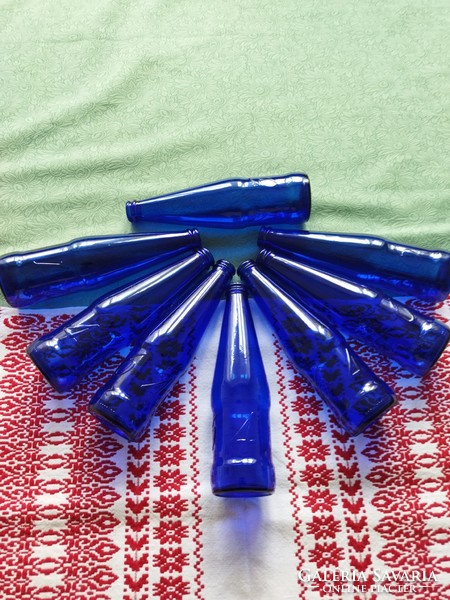 8 blue bottles in one