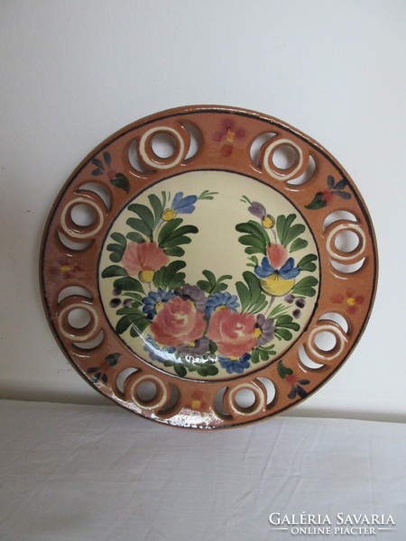 Old, hand-painted, marked ceramic wall plate. Negotiable!