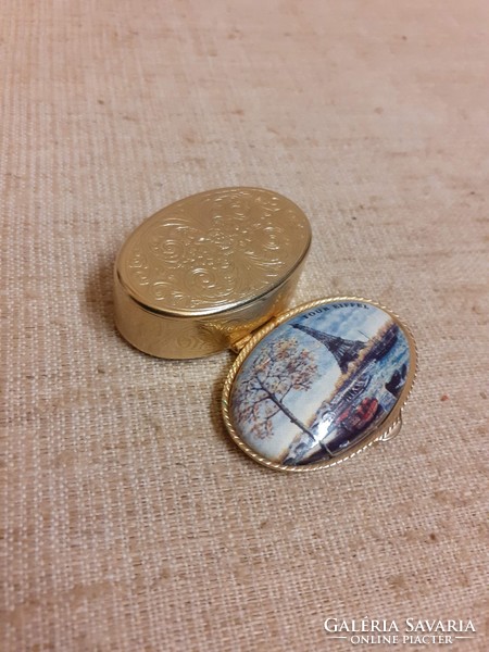 Old gilded, chiseled small box with a porcelain Paris skyline on top