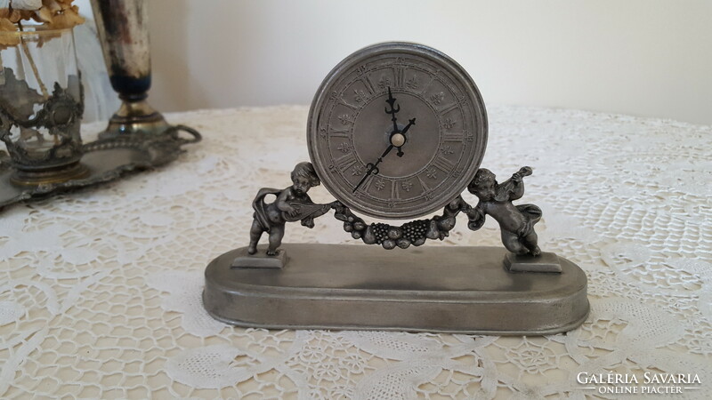 Beautiful, old, angelic, putty pewter table clock