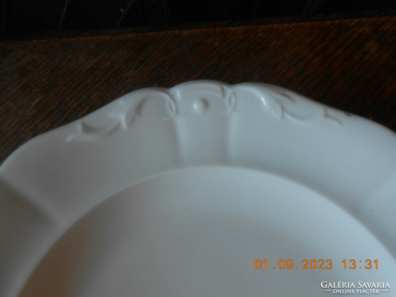 Antique porcelain bowl with tendril pattern