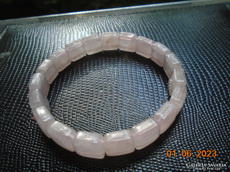 Bracelet made of 18 polished, faceted square flat elements of rose quartz