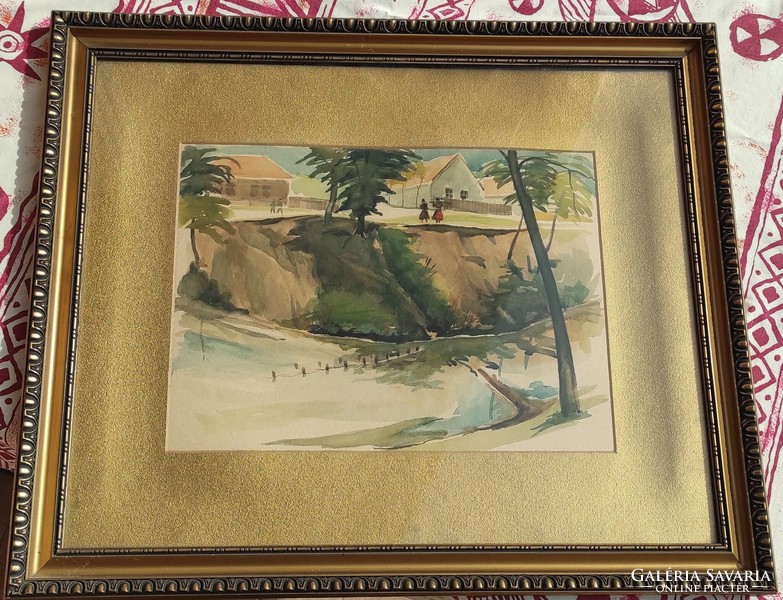 Watercolor landscape with a golden border in a golden frame