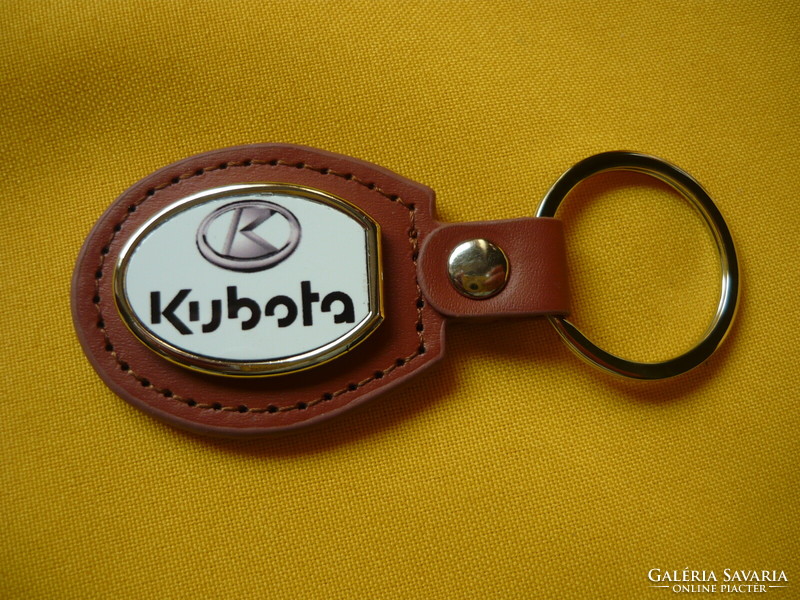 Kubota oval metal key ring on a leather base