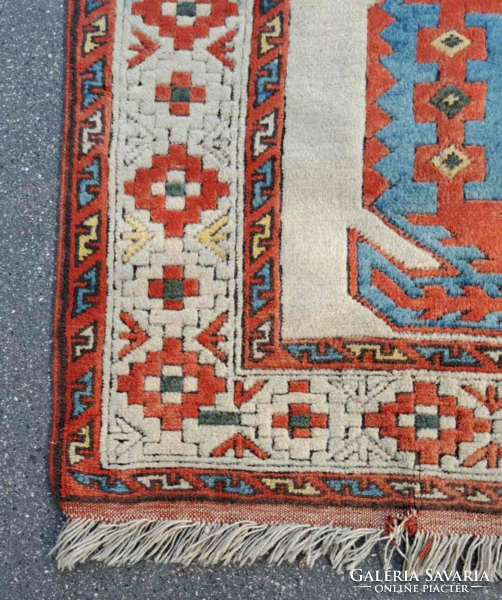 Hand-knotted old carpet