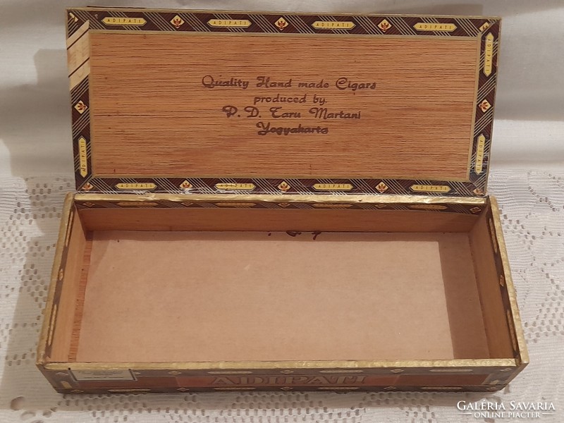 Maybe an old cigar box or cigarette box
