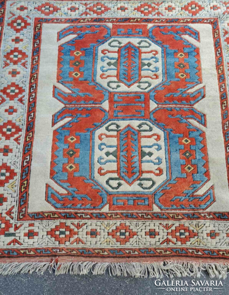 Hand-knotted old carpet