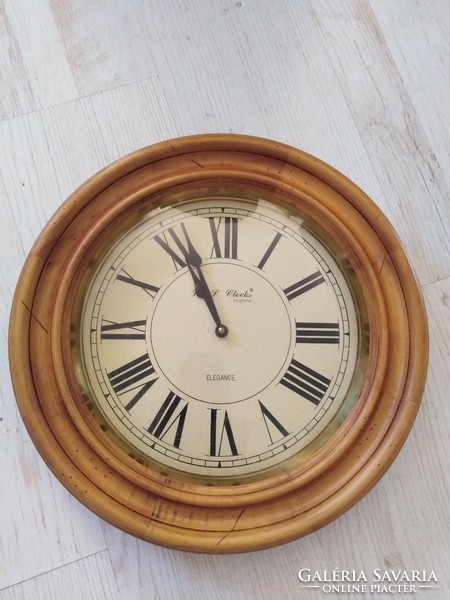 Wall clock - in a wooden frame