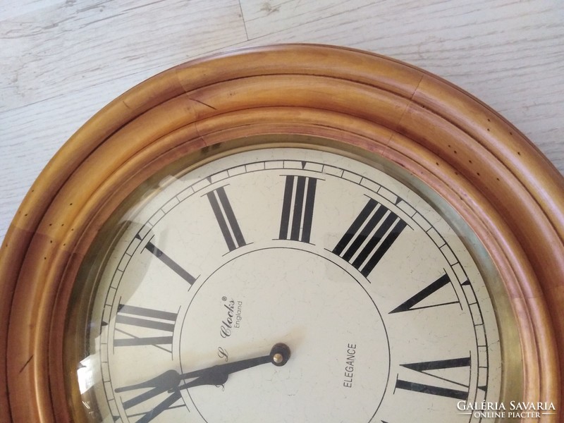 Wall clock - in a wooden frame