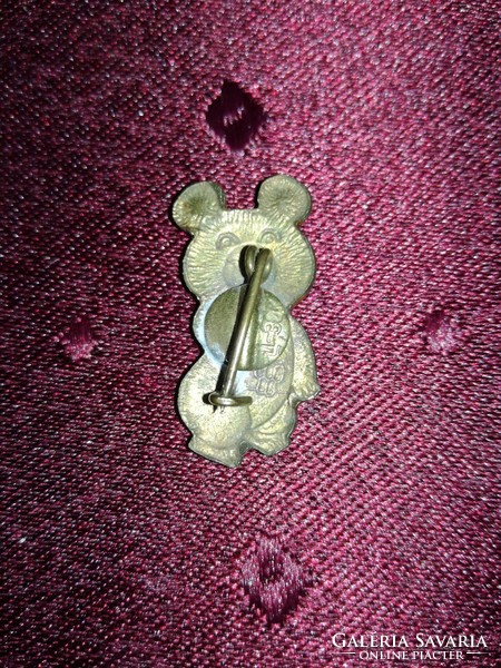 Old bear badge made of metal