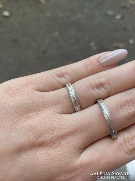 Pair of silver engagement rings