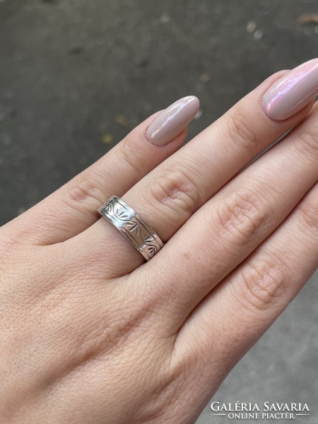 Silver hoop ring with tendril pattern