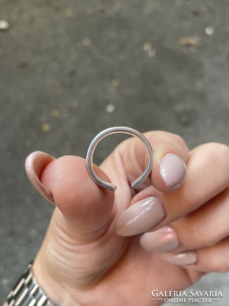 Silver hoop ring with tendril pattern
