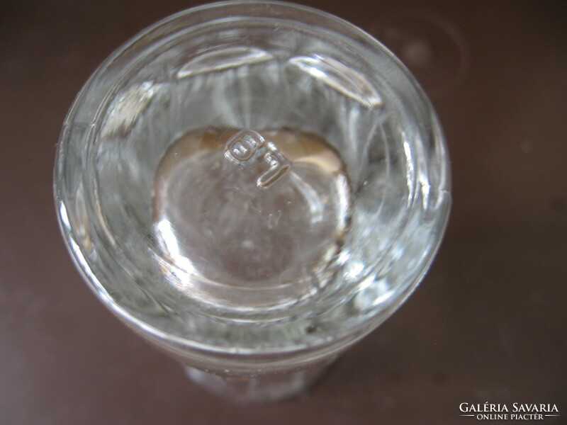 Thick calibrated brandy glass of 2 and 4 cl at the bottom