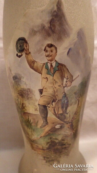 Old glass jug with glasses with a painting of a hunting trophy