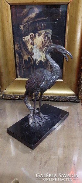 Antique heron bird sculpture