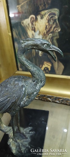 Antique heron bird sculpture