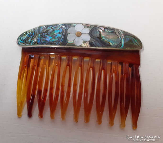 A hair clip hair comb made of mother-of-pearl shells