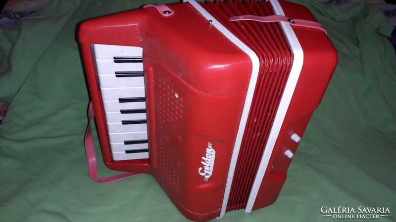 Retro plastic working toy smaller German tango accordion with paper whistle as shown in the pictures