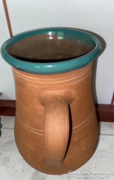 Handmade 23 cm high folk ceramic jug with glazed mouth and interior