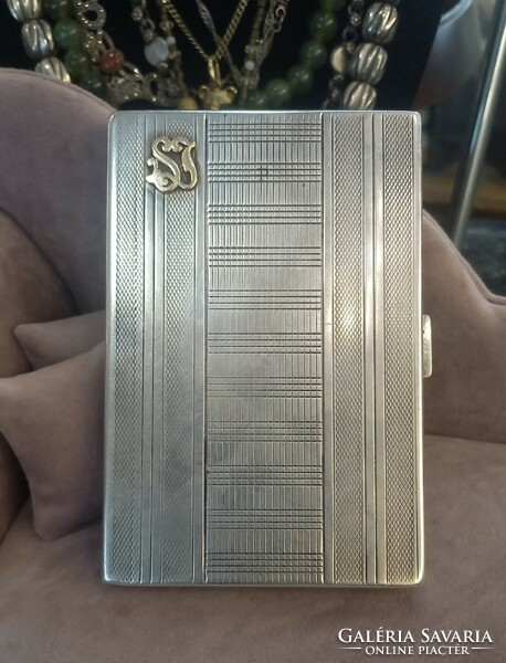 Antique silver cigarette case with gold monogram