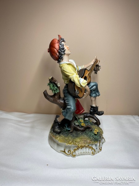 Capodimonte Italian porcelain playing boy with guitar 25cm