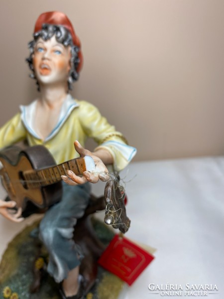 Capodimonte Italian porcelain playing boy with guitar 25cm