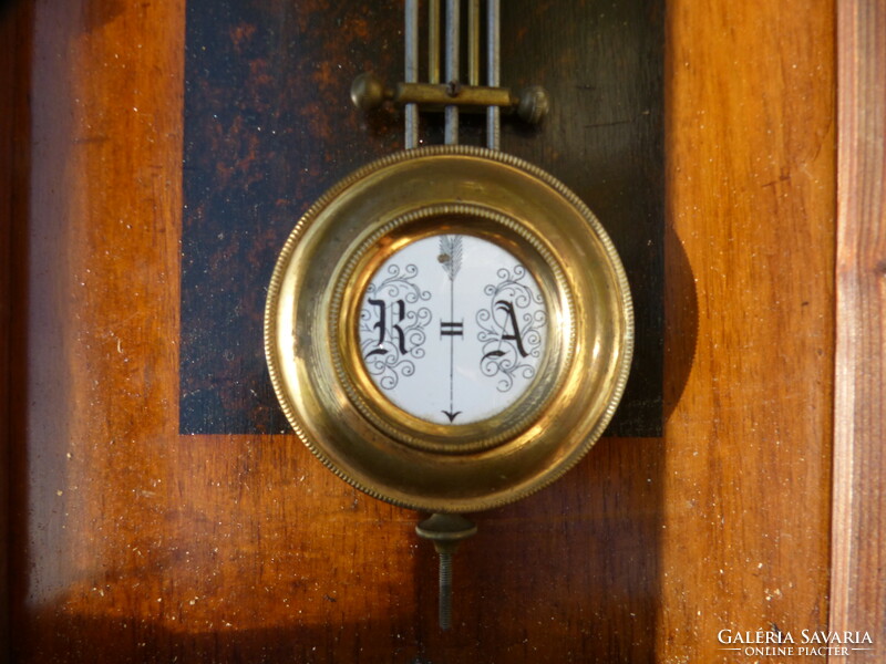 Tin German wall clock.