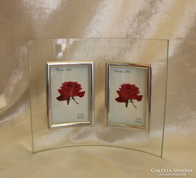 Elegant new double picture frame, made of bent polished glass