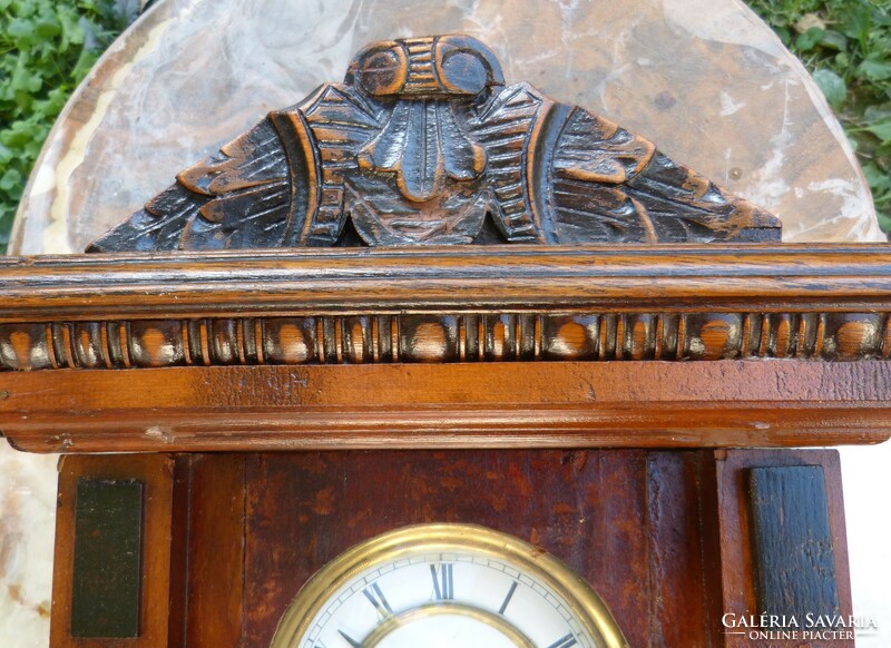 Tin German wall clock.