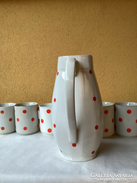 Zsolnay red polka dot jug with six mugs.