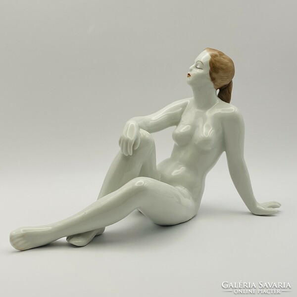 Raven House porcelain figure - seated female nude