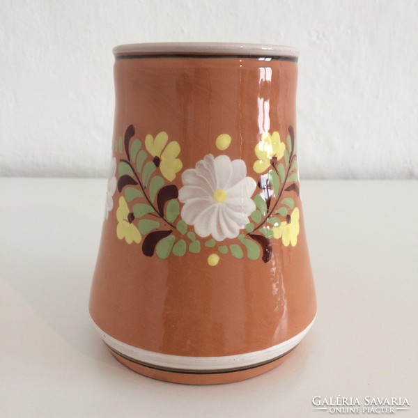 Glazed folk ceramic jug with flower pattern