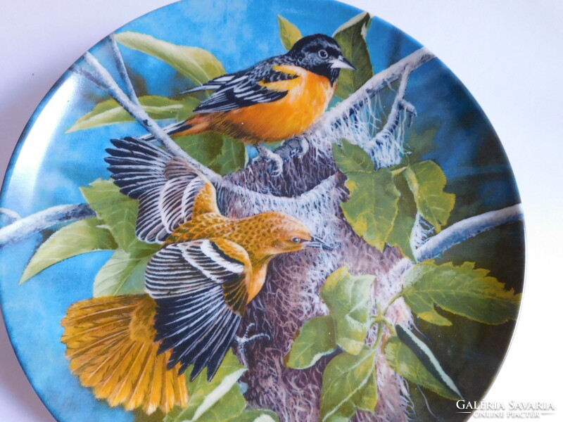 English porcelain bird plate (orange trupial) - encyclopaedia britannica collection