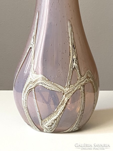 Retro design glass vase decorated with beige stripes and bubbles in a pink shade