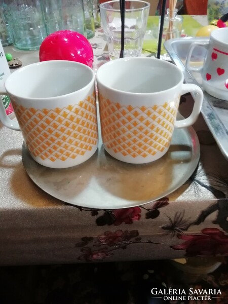 Retro porcelain mugs with yellow pattern in perfect condition