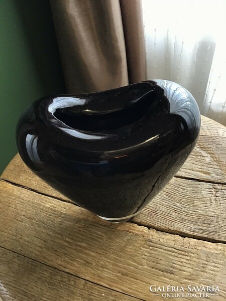 Old handmade heart-shaped glass vase, blackish purple