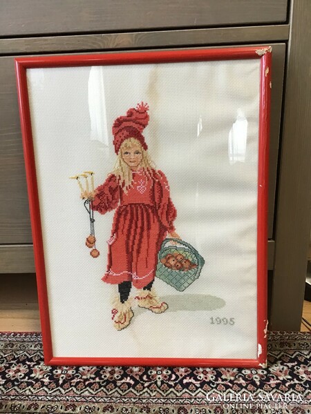 Old Swedish Christmas decoration, cross-stitch embroidered wall picture in a glazed wooden frame