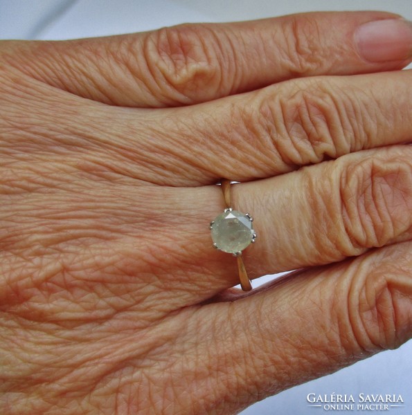 Különleges arany és platina gyűrű nagy  0,6ct  gyémánttal akció!