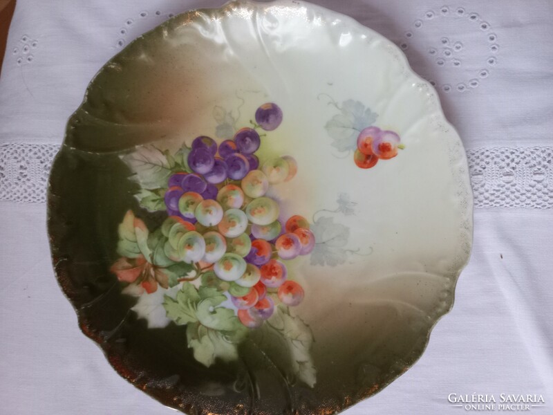 Beautiful porcelain plate with grape pattern