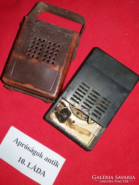 I am selling an antique pocket radio with a leather case as an untested part according to the pictures