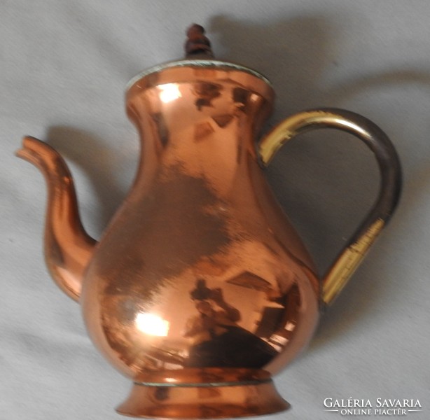 Red copper jug with copper handle