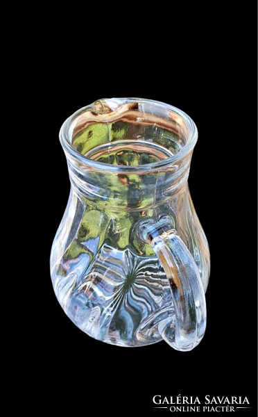 Old, small, polished glass jug. 10.5 cm high.